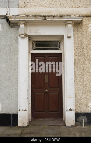 Brown number 78 wooden front door of period terraced house in Brecon Powys Wales UK Stock Photo