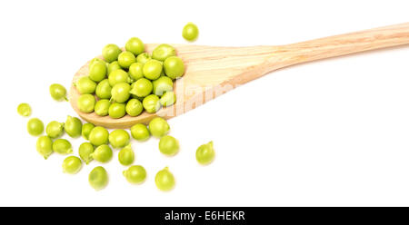 fresh green peas with wooden spoon isolated on white background Stock Photo