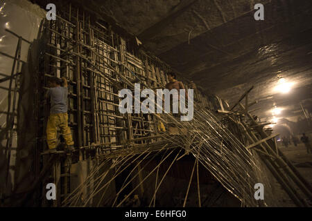 Tehran, Iran. 24th Aug, 2014. August 24, 2014 - Tehran, Iran - Iranian workers work at a workshop of the northern part of Tehran's Subway Line 3. Subway line 3 with 37 km (23 miles) long and 28 stations will be the main public transportation and connection between southwest and northeast of Tehran. Morteza Nikoubazl/ZUMAPRESS © Morteza Nikoubazl/ZUMA Wire/Alamy Live News Stock Photo