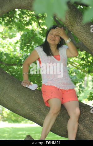 Woman wearing shorts hi-res stock photography and images - Alamy