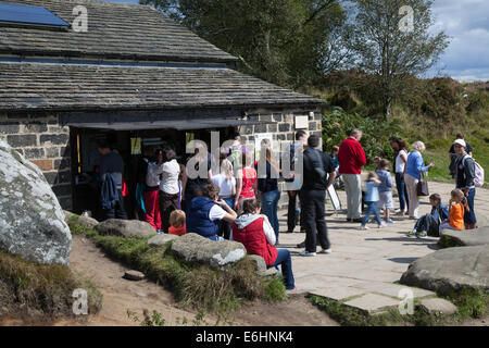 Brimham Rocks balancing natural rock formations in North Yorkshire Dales,  Active kids and visiting tourists at the National Trust Site with holidayin Stock Photo