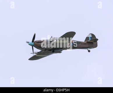 Dunsfold, UK. 23rd Aug, 2014. Dunsfold aerodrome in Surrey holds an annual motor and airshow over the August Bank Holiday weekend.  Here Hawker Hurricane IIC RAF World War 2 fighter aircraft of the Battle of Britain Memorial Flight displays on Saturday 23rd Credit:  Niall Ferguson/Alamy Live News Stock Photo