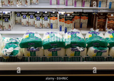 Milk in bags not bottles in a Canadian supermarket Stock Photo