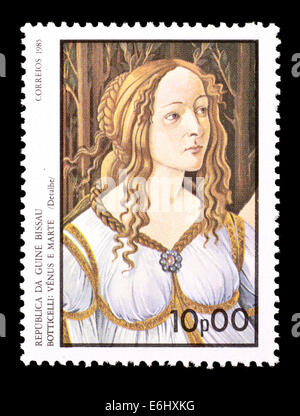 Postage stamp from Guinea-Bissau depicting detail from the Sandro Botticelli painting 'Venus and Mars' Stock Photo