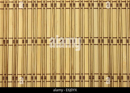 Table mat made out of bamboo pieces Stock Photo