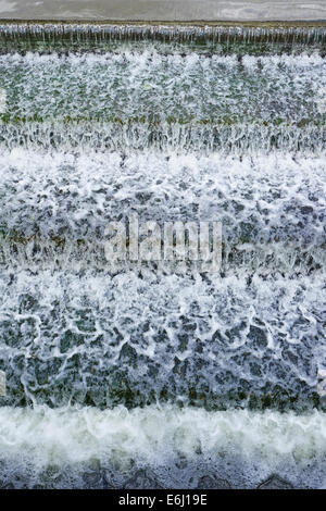 Water Flowing Over A Weir On The River Great Ouse Bedford Bedfordshire UK Stock Photo