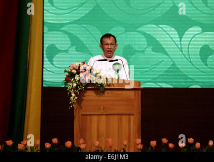 Nay Pyi Taw, Myanmar. 25th Aug, 2014. Kan Zaw, Myanmar minister of national planning and economic development, speaks during the opening ceremony of the 46th ASEAN Economic Ministers' Meeting and related meetings at Myanmar International Convention Center in Nay Pyi Taw, Myanmar, on Aug. 25, 2014. Credit:  U Aung/Xinhua/Alamy Live News Stock Photo