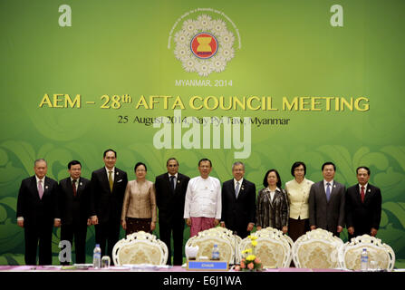 Nay Pyi Taw, Myanmar. 25th Aug, 2014. ASEAN Secretary-General Le Luong Minh (1st R) and ASEAN economic ministers pose for a group photo during the 28th ASEAN Free Trade Area Council Meeting at Myanmar International Convention Center in Nay Pyi Taw, Myanmar, on Aug. 25, 2014. Credit:  U Aung/Xinhua/Alamy Live News Stock Photo