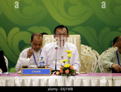 Nay Pyi Taw, Myanmar. 25th Aug, 2014. Kan Zaw, Myanmar minister of national planning and economic development, speaks during the 28th ASEAN Free Trade Area Council Meeting at Myanmar International Convention Center in Nay Pyi Taw, Myanmar, on Aug. 25, 2014. Credit:  U Aung/Xinhua/Alamy Live News Stock Photo