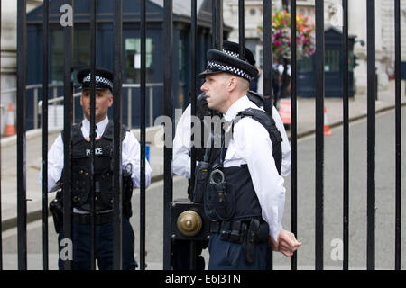 Police Guarding the Gates at 10 Downing Street City of Westminster London England Stock Photo