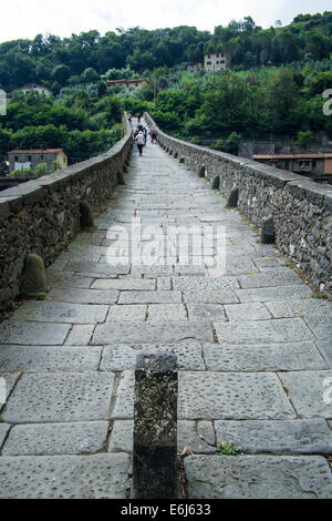 'Ponte della Maddalena' bridge aka Ponte del Diavolo (Devils Bridge) in Borgo a Mozzano over the river Serchio in the Lucca province of Tuscany, Italy Stock Photo