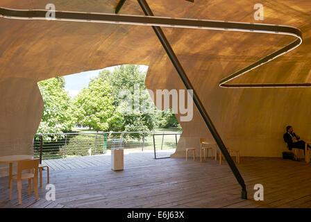 Serpentine Summer Pavilion 2014 outside The Serpentine Gallery in London designed by Smiljan Radic View looking out of Entrance Stock Photo