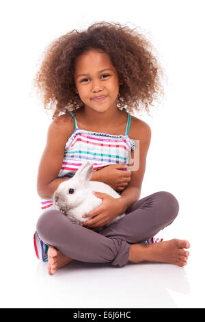 Cute little African Asian girl, over white background Stock Photo - Alamy