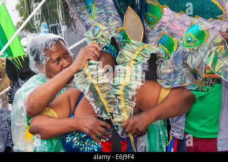 London, UK. 25th August, 2014. Despite the wet weather, thousands of people attend the Notting Hill Carnival in West London. Credit:  Paul Davey/Alamy Live News Stock Photo