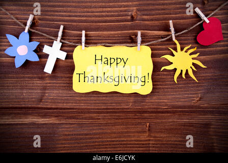 Happy Thanksgiving Greetings Hanging on a Line with Different Symbols Stock Photo