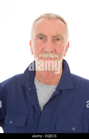 Senior laborer in blue work wear isolated over white background Stock Photo