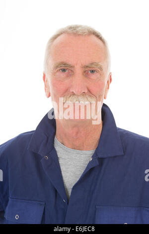 Senior laborer in blue work wear isolated over white background Stock Photo