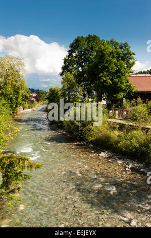River running through the ski resort of Kitzbuhel in Austria Stock Photo