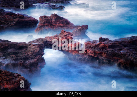 Arch on lanai coast. Hawaii Stock Photo