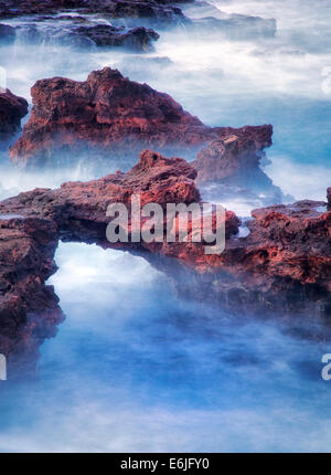 Arch on lanai coast. Hawaii Stock Photo