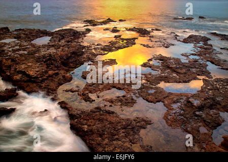 Sunset reflection at low tide. Lanai, Hawaii. Stock Photo