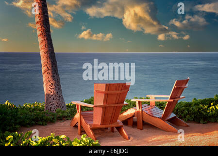Two adirondac chairs overlooking ocean at Four Sesons. Lanai, Hawaii. Stock Photo