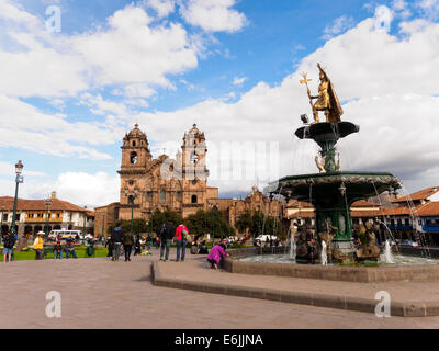 Fountain with statue of Pachacuti Inca Yupanqui or Pachacutec and the Iglesia de la Compania de Jesus in the background - Cusco, Peru Stock Photo