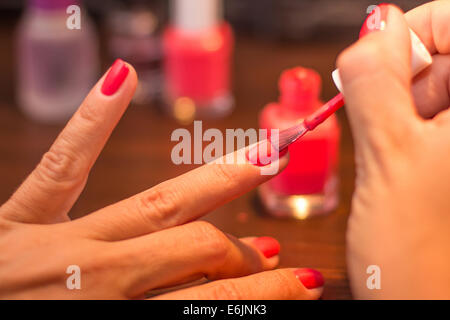Red finger nails painting Stock Photo