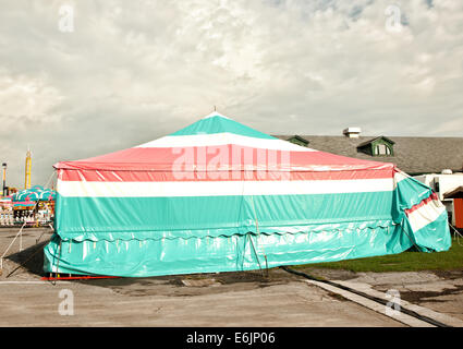 circus tent style covering for vendors and games of chance booths at a fair Stock Photo