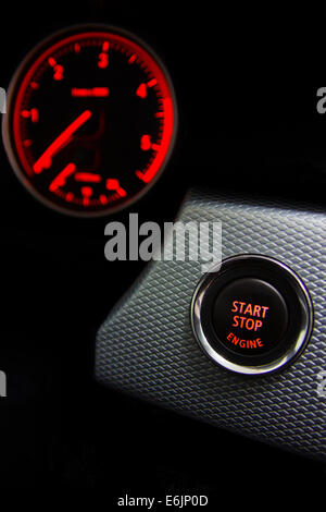 Start Stop engine button in sport car Stock Photo