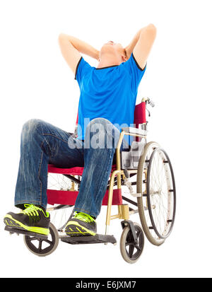 depressed and handicapped man sitting on a wheelchair Stock Photo