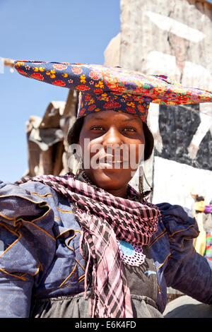 Herero woman with typical headdress, Namibia Stock Photo