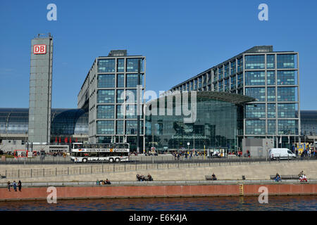 Sightseeing bus in front of Berlin Hauptbahnhof main railway station, Spree River at the front, Berlin, Germany Stock Photo