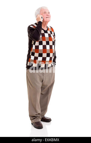 elderly man making a phone call with cell phone isolated on white background Stock Photo