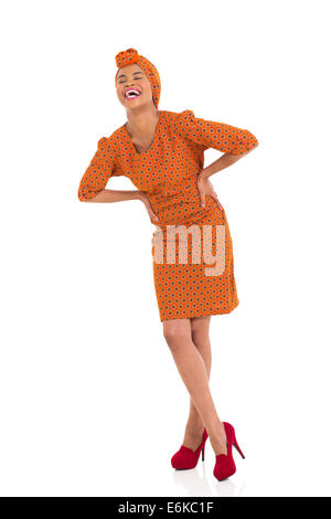 laughing young African woman in traditional clothes Stock Photo