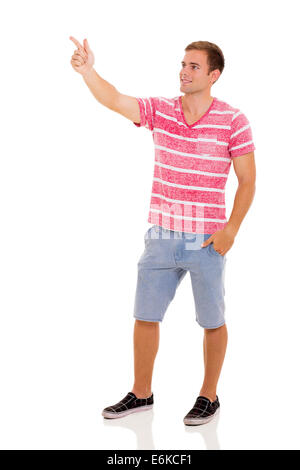 cute young man pointing empty copy space isolated on white Stock Photo