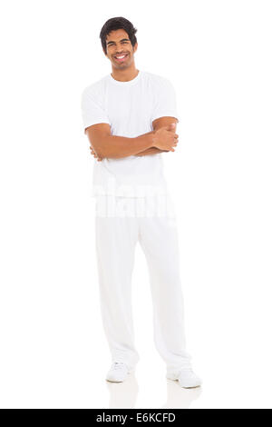 good looking young Indian guy standing on white background Stock Photo