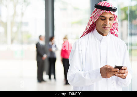 modern Islamic businessman using smart phone Stock Photo