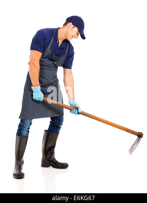 gardener working with a hoe isolated on white background Stock Photo