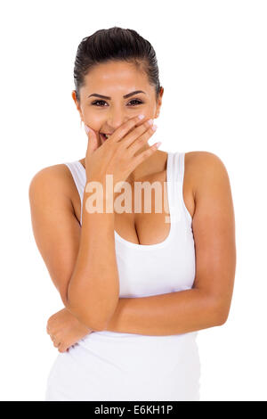 happy young woman covering her mouth and laughing Stock Photo