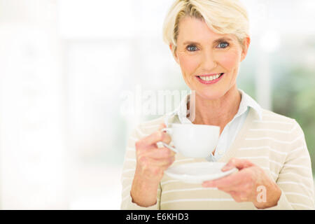beautiful senior woman having coffee Stock Photo