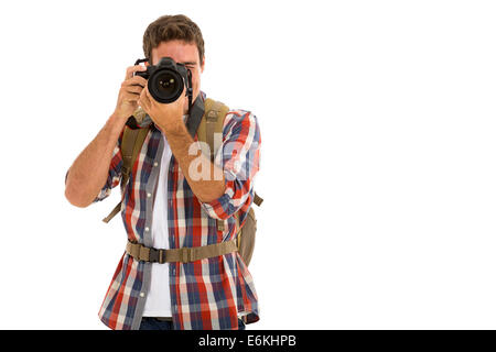 young man taking photos isolated on white background Stock Photo