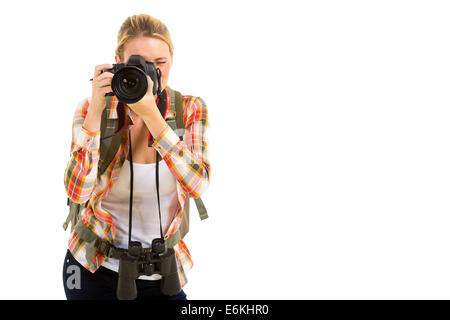 pretty female traveller using digital camera taking photos Stock Photo