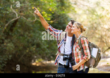 young couple hikers in mountain valley Stock Photo