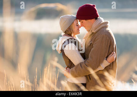 loving young couple in autumn morning by the river Stock Photo