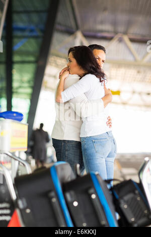 sad young couple say goodbye at airport Stock Photo