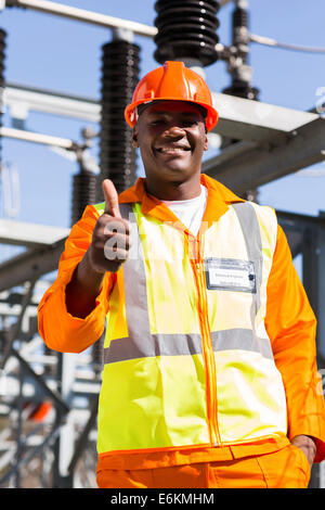 happy African electrical engineer giving thumb up Stock Photo