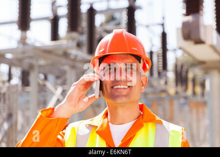happy senior electrical engineer talking on cell phone Stock Photo