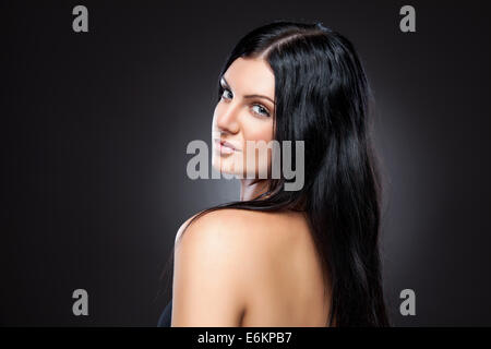 Young beauty with long dark hair Stock Photo