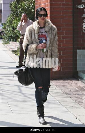 Krysten Ritter, wearing The Rolling Stones T-shirt , walks in Beverly